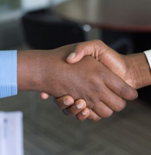 Two people shaking hands