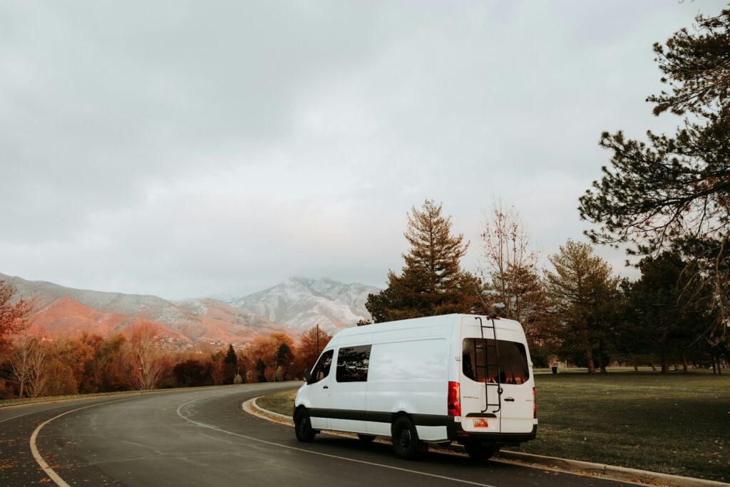 Van driving down a mountain road