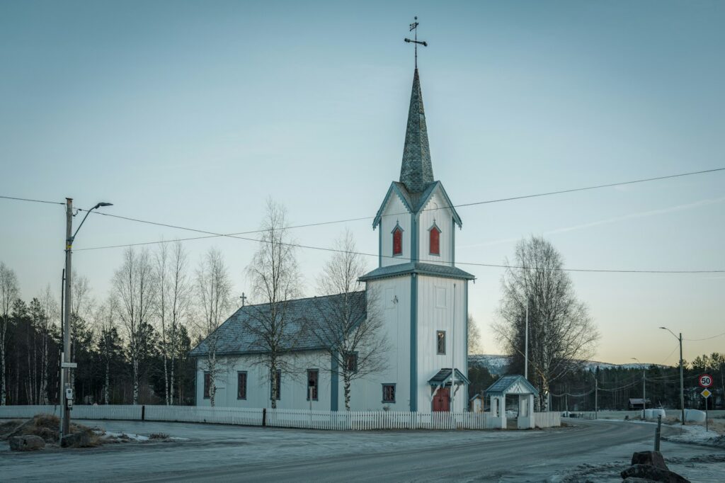 White wooden church in the snow
